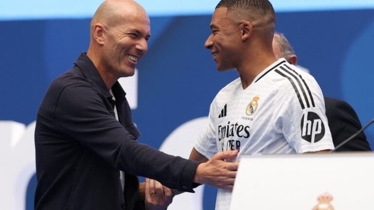 Zinedine Zidane joins fans in welcoming Kylian Mbappe to packed Bernabeu as Real Madrid star's proud mum fights back tears